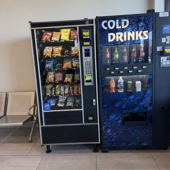 On site vending machines stocked with snacks and cold drinks inside Retro Laundry Co. laundromat