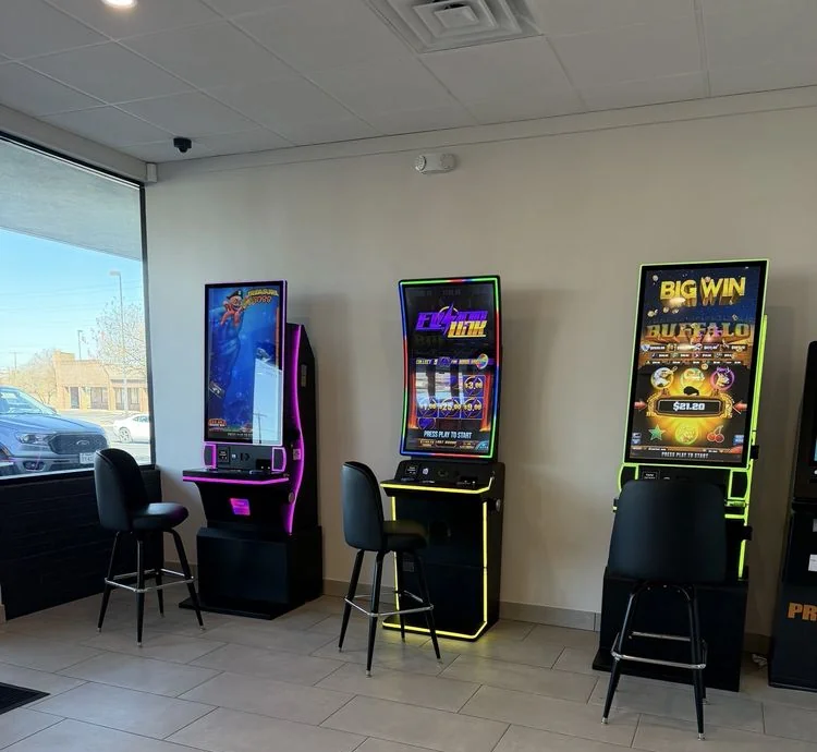Retro pinball and arcade game room inside Retro Laundry Co. self serve laundromat in San Antonio